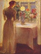 Anna Ancher Young Girl Before a Lit Lamp oil on canvas